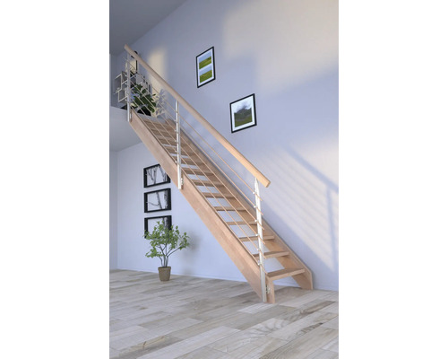 Escalier en bois avec rampe en acier inoxydable dans une pièce lumineuse