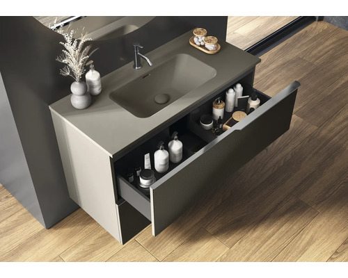 Meuble sous-vasque avec tiroir et lavabo dans la salle de bain