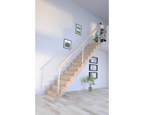 Escalier en bois clair avec garde-corps en acier inoxydable dans une pièce lumineuse.