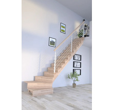 Escalier en bois clair avec rampe en acier inoxydable dans une pièce au design moderne.