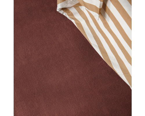 Nahaufnahme einer Oberfläche und eines gestreiften Stoffes