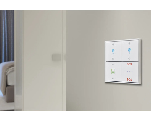 Interrupteur d''éclairage intelligent avec quatre boutons pour commander la lumière et les appareils