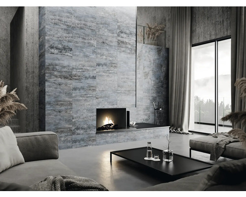 Salon avec canapé, table basse, cheminée et carreaux muraux au design moderne.