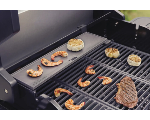 Barbecue avec crevettes, ail et steak