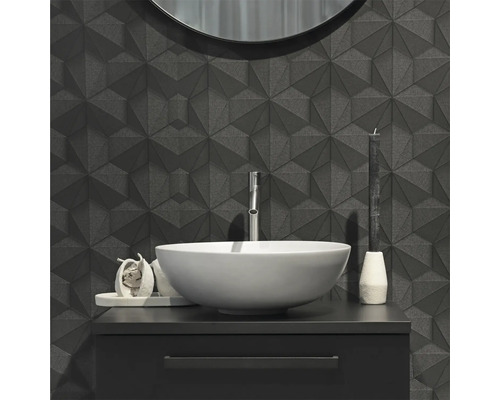 Salle de bains moderne avec carrelage mural géométrique, meuble-lavabo et miroir rond