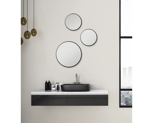 Salle de bain moderne avec lavabo, meuble sous-vasque et miroirs ronds