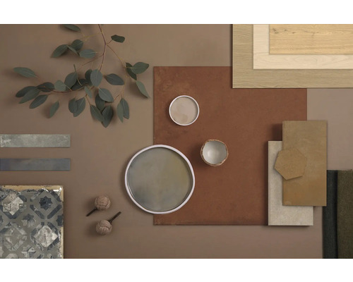 Zusammenstellung von Baumaterialien und Dekorationselementen für die Raumgestaltung.