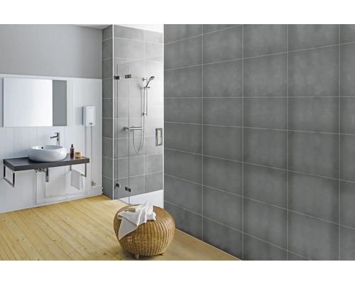 Salle de bain avec douche, lavabo et carreaux gris