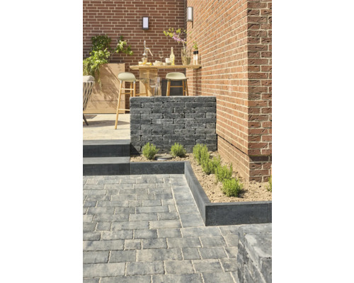 Extérieur avec pavés, mur et bar