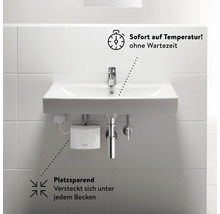 Waschtisch mit Wasserhahn und Untertischgerät zur schnellen Warmwasserbereitung.
