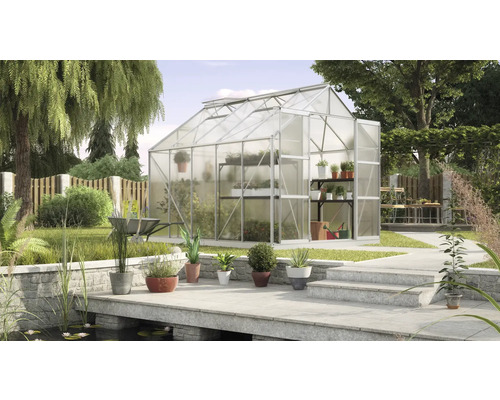 Serre de jardin avec plantations et bassin