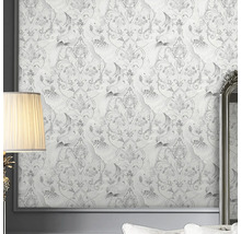 Papier peint avec motif d''oiseaux et de fleurs sur le mur