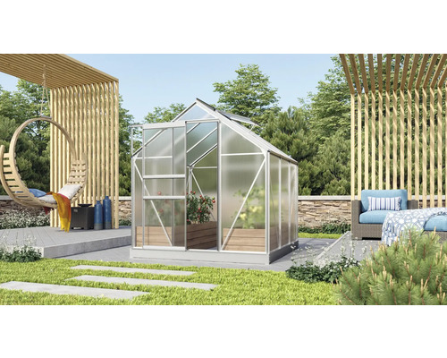 Serre de jardin avec mobilier de jardin et décoration