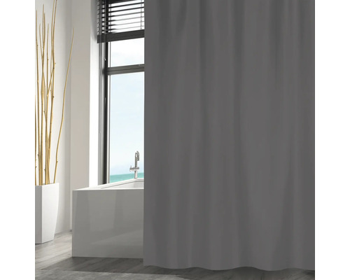 Salle de bain avec baignoire et rideau de douche gris