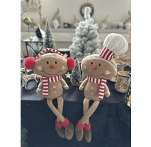 Deux poupées bonhomme en pain d''épices avec écharpe et toque de cuisinier comme décoration de Noël