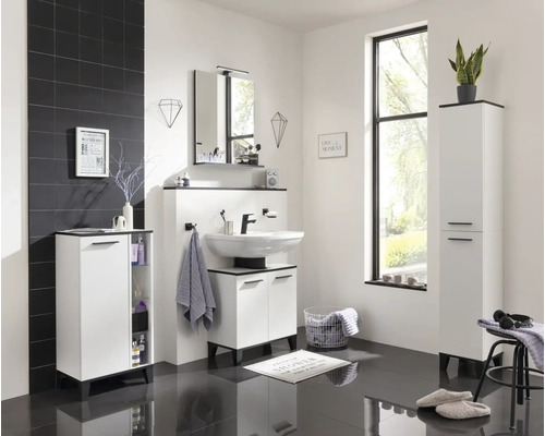 Salle de bain avec lavabo, armoire de toilette, armoire haute et meuble bas dans un design moderne et lumineux.