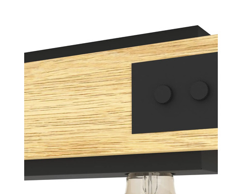 Detailaufnahme einer Deckenleuchte aus Holz mit Metallelementen