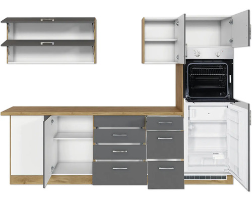 Cuisine équipée avec armoires, tiroirs, four et réfrigérateur