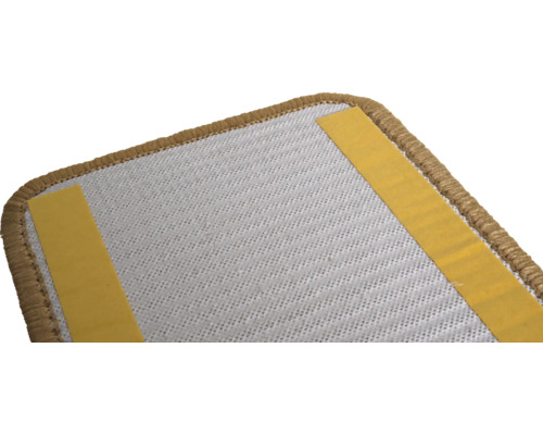 Vue détaillée d''un tapis avec des bandes adhésives au dos