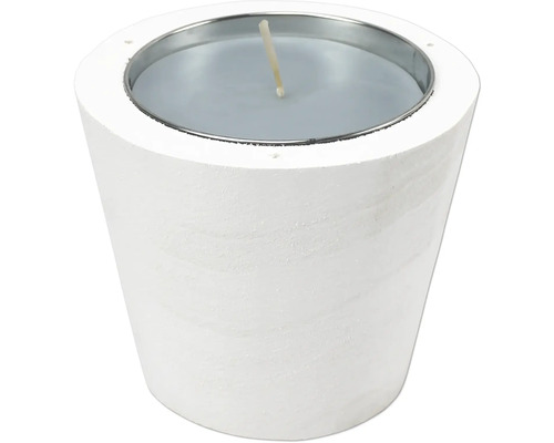 Bougie dans un bougeoir en béton blanc