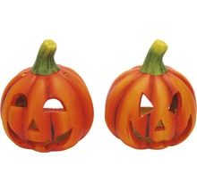 Zwei Halloween Kürbis Laternen mit geschnitzten Gesichtern