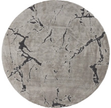 Tapis rond avec motif abstrait