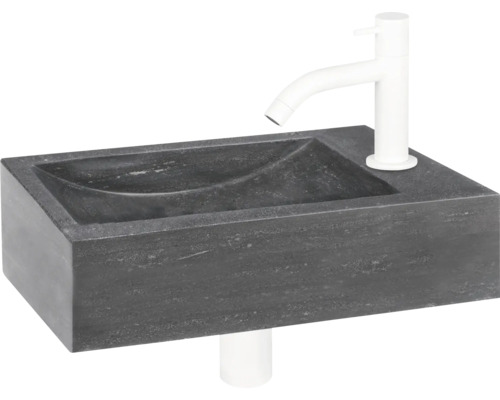 Waschtisch aus Stein mit Armatur