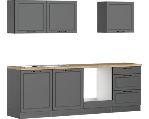 Cuisine linéaire avec meubles bas, tiroirs et meubles hauts sous un plan de travail en bois