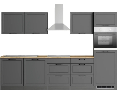 Cuisine moderne avec armoires, tiroirs, plan de travail, hotte aspirante et four