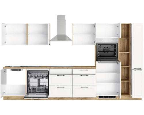 Cuisine complète avec lave-vaisselle, cuisinière, hotte aspirante et armoires.