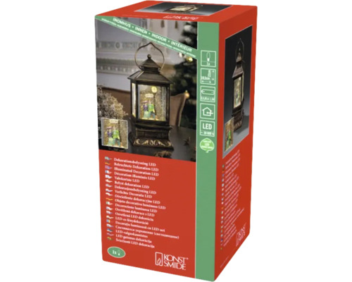 Emballage d''une lanterne LED d''intérieur avec motif hivernal et logo Konst Smide