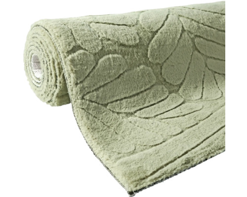 Aufgerollter Teppich mit Blätterdesign