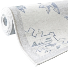 Tapis enroulé avec motif