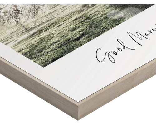 Gerahmtes Bild mit Landschaftsmotiv und dem Schriftzug Guten Morgen