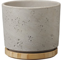 Pot de fleurs en béton avec soucoupe en bambou