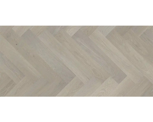 Pose de parquet clair en motif à chevrons