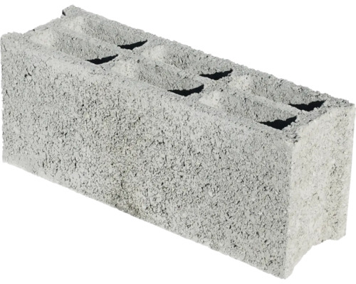 Grauer Betonblock mit Aussparungen