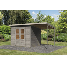 Abri de jardin en bois avec annexe sur une surface pavée