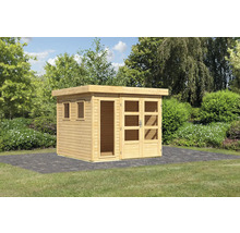 Abri de jardin en bois avec fenêtre et porte dans le jardin