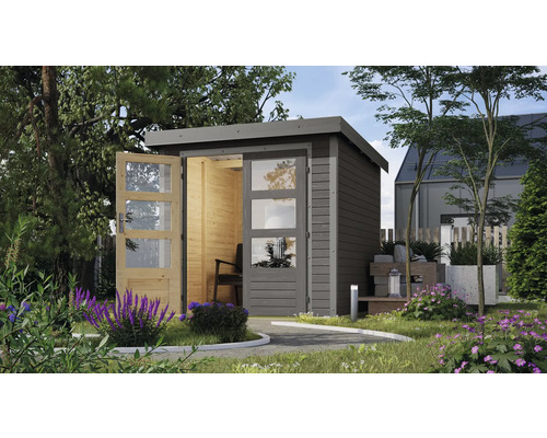 Garten mit modernem Holzgartenhaus mit Glastüren und gepflastertem Weg