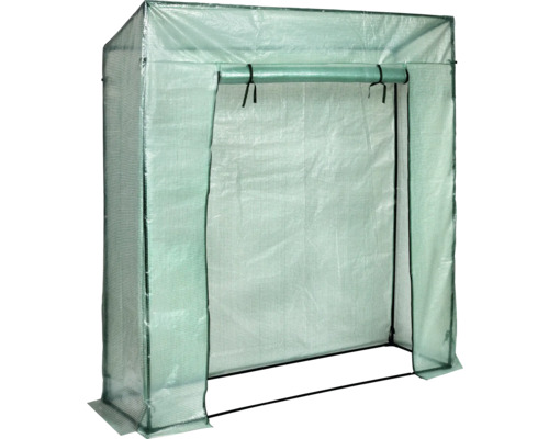 Serre avec revêtement en film plastique et porte ouverte