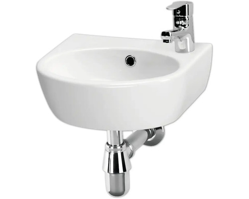 Lavabo en céramique blanc avec robinet et siphon