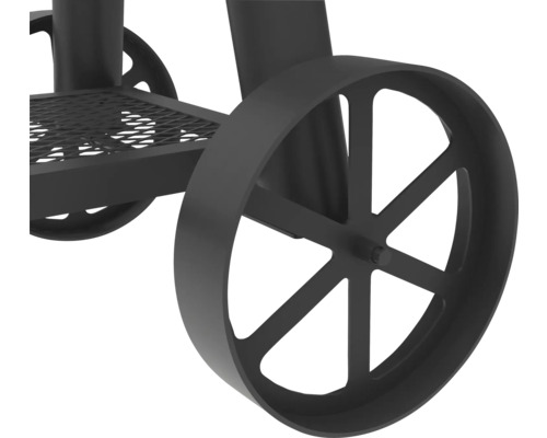 Gros plan sur les roues du barbecue et la grille de rangement.