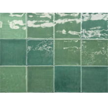 Motif de carreaux en vert avec une surface brillante