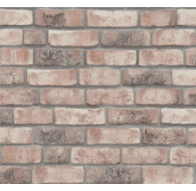 Gros plan d''un papier peint à motif de briques