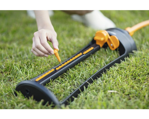 Gartenregner mit Düsenverstellung auf Rasen