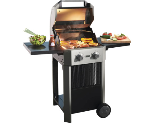 Buschbeck Elektrogrill Grenada Gasgrill mit Speisen auf dem Grillrost und Beilagen auf den Ablageflächen