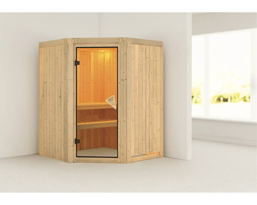 Sauna en bois avec porte en verre et bancs
