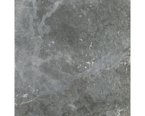 Nahaufnahme einer grauen Bodenfliese mit Betonoptik