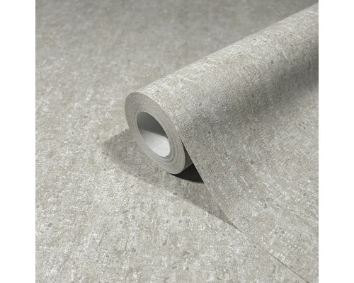 Eine Rolle Vinyltapete mit Steindekor.